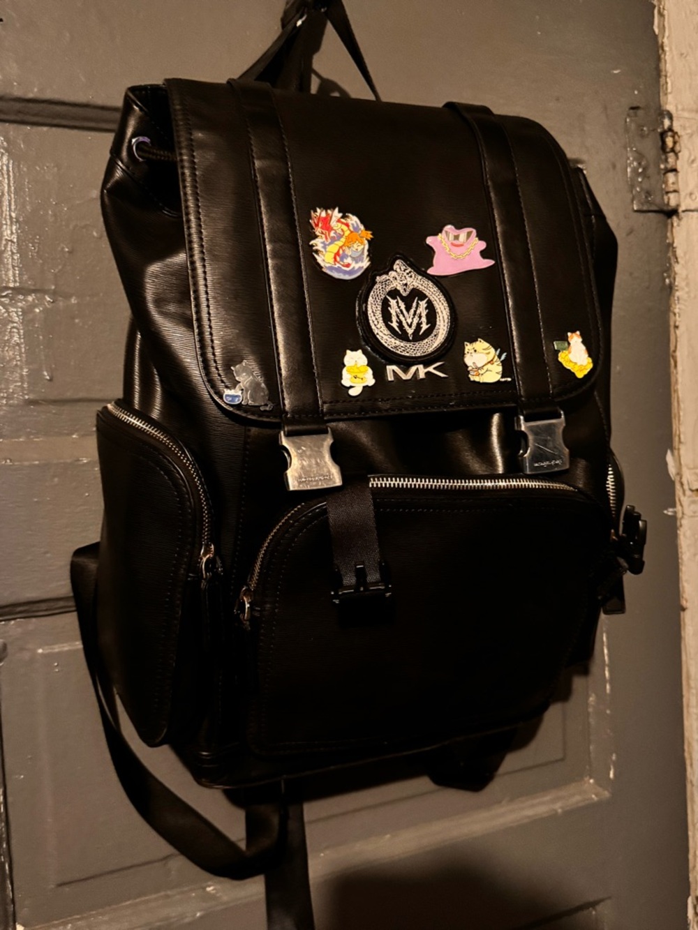 Michael Kors Black Leather Men's Backpack with Front Pockets and Pins